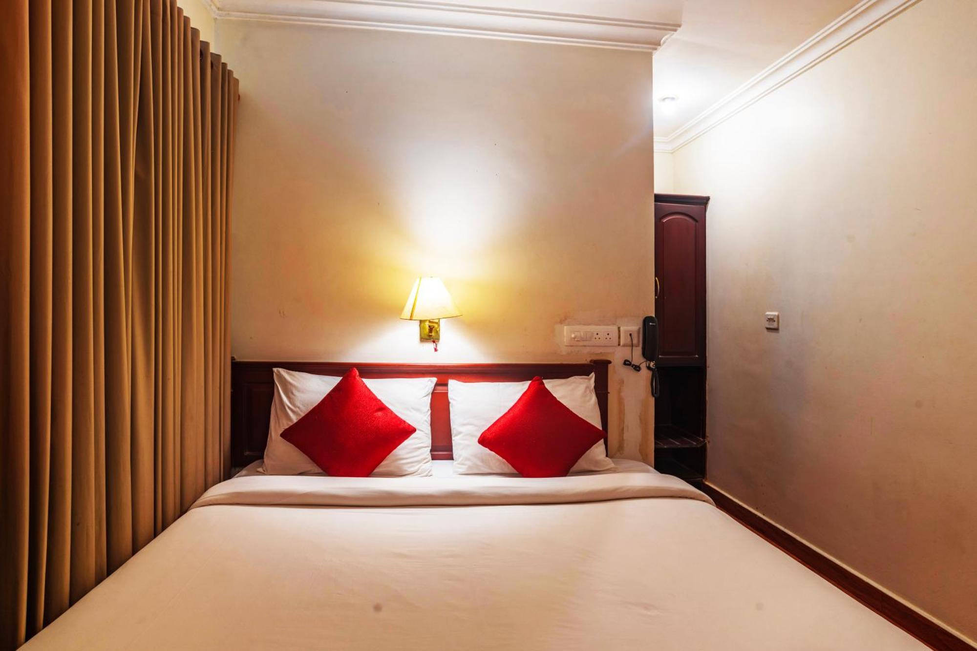 Hotel Archana Inn Kochi Quarto foto