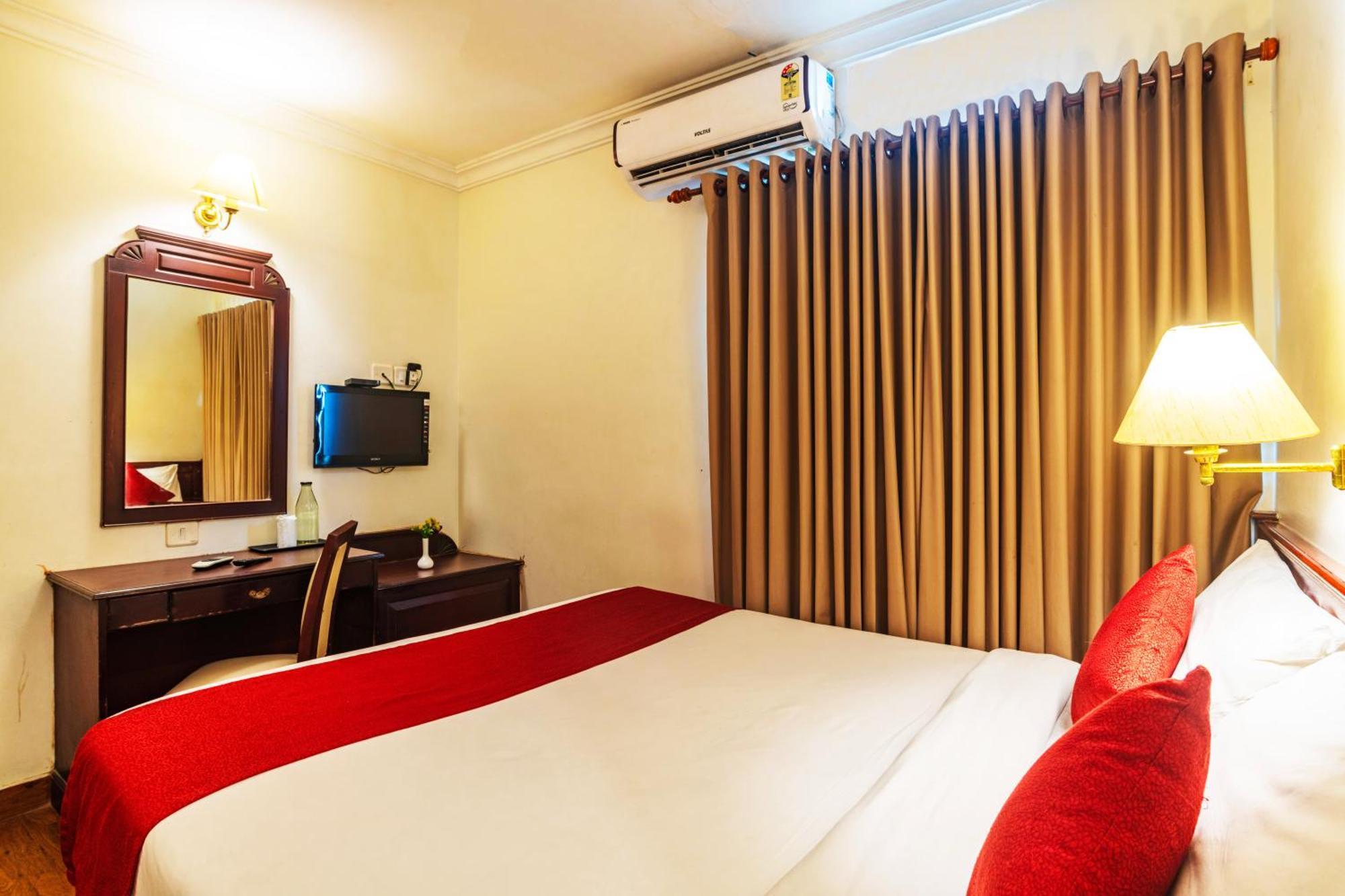 Hotel Archana Inn Kochi Quarto foto