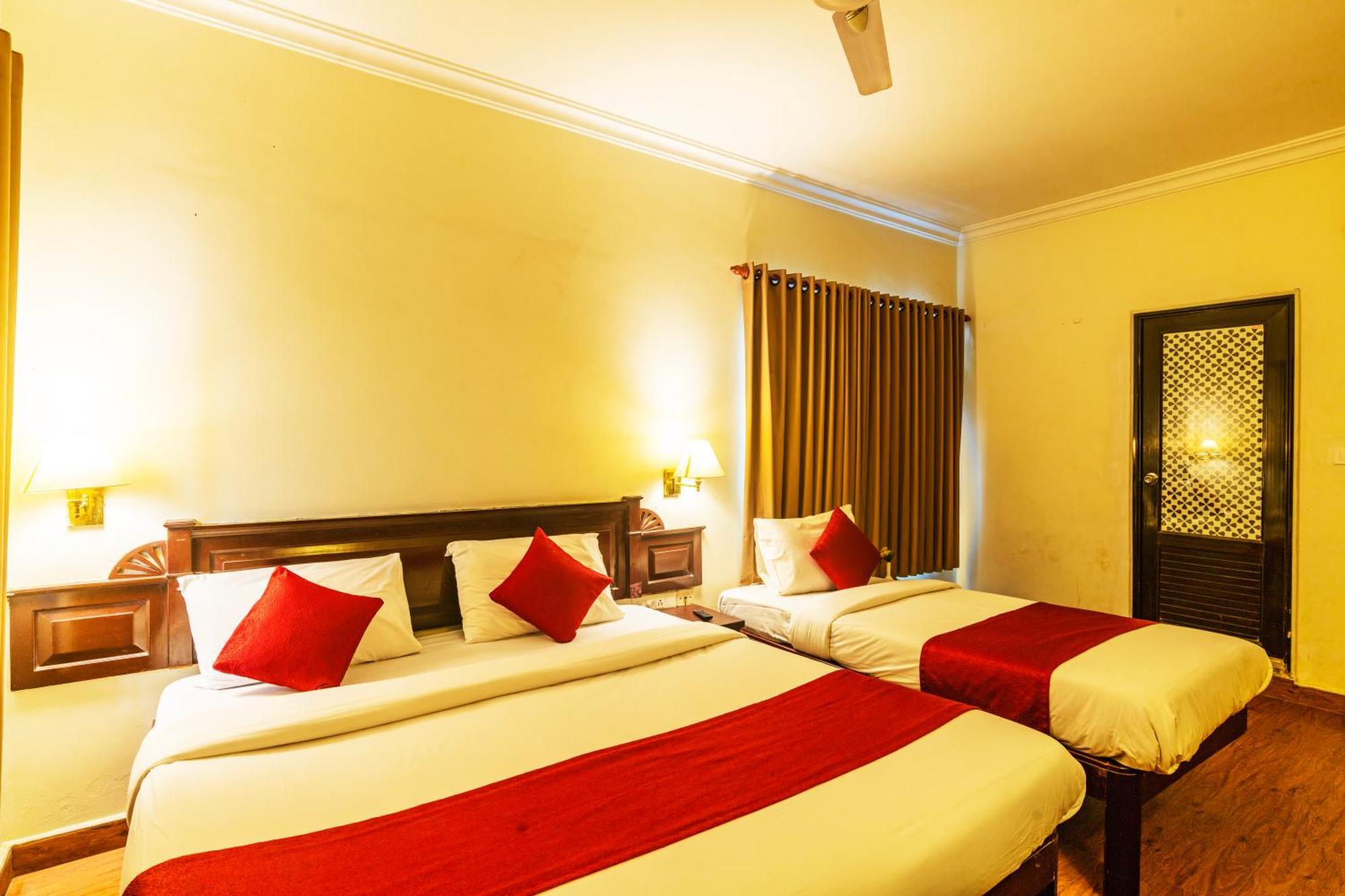 Hotel Archana Inn Kochi Quarto foto