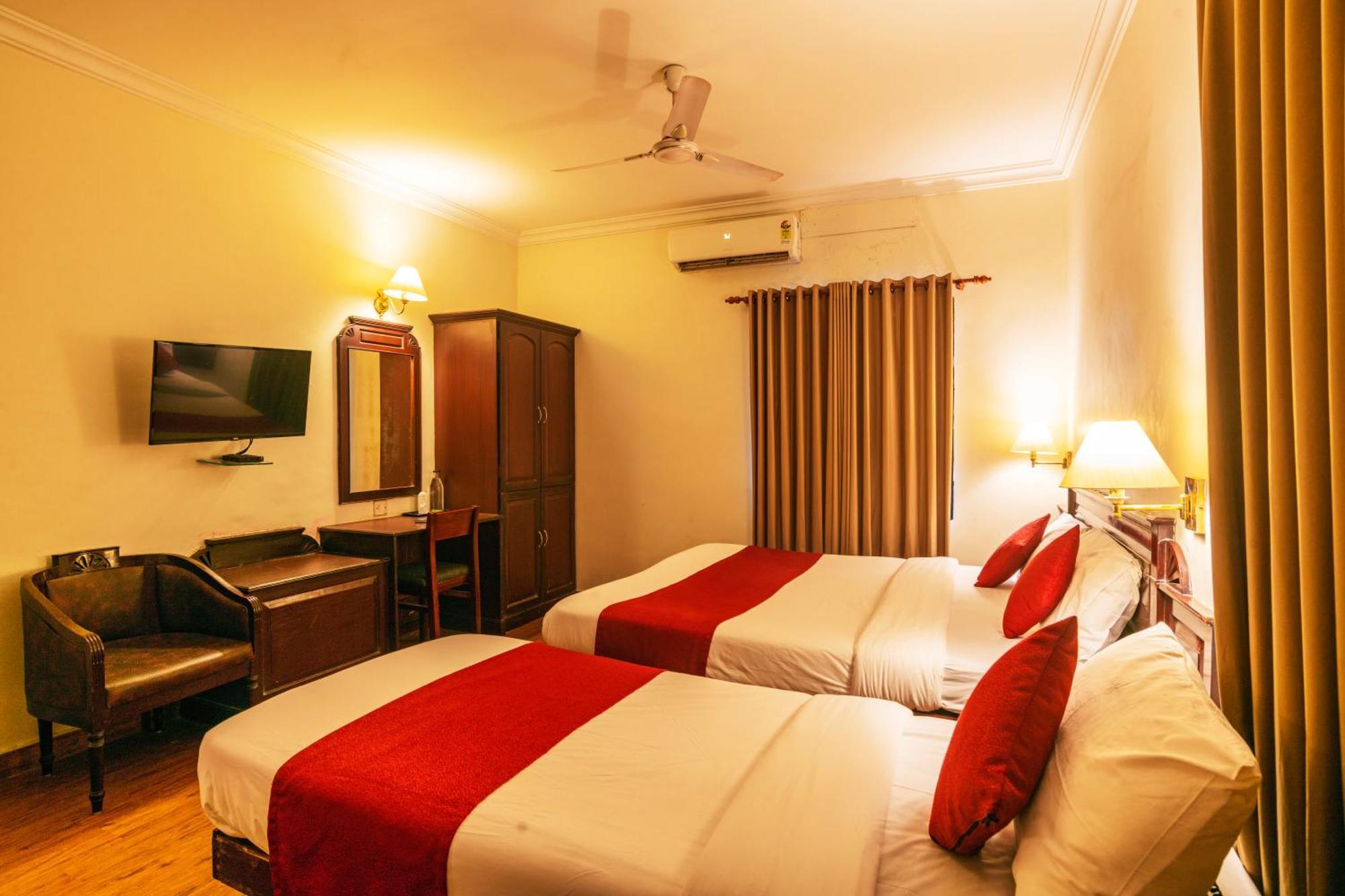 Hotel Archana Inn Kochi Quarto foto