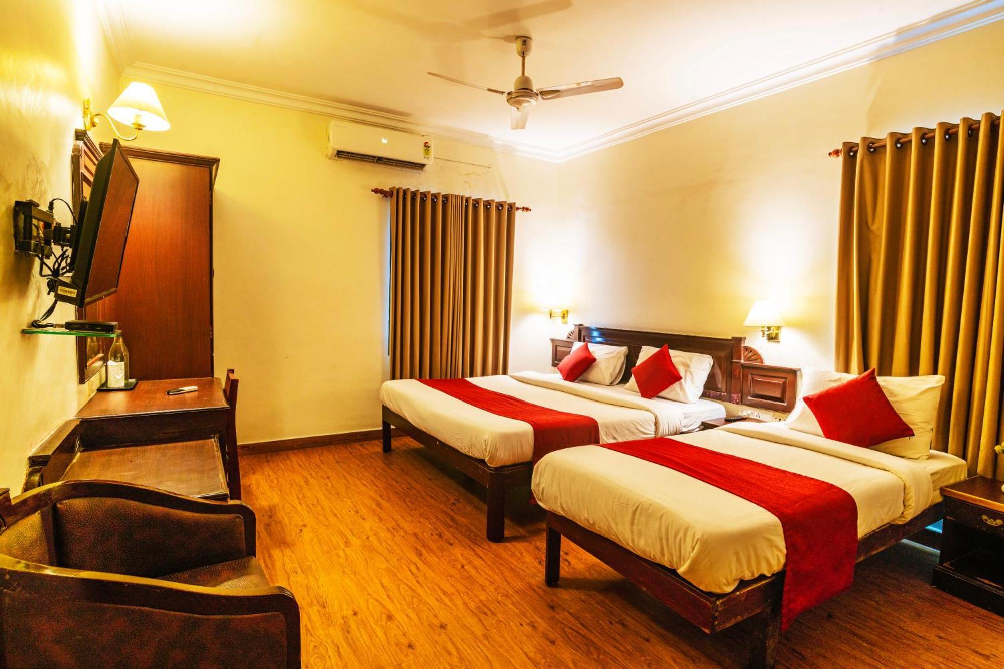 Hotel Archana Inn Kochi Quarto foto